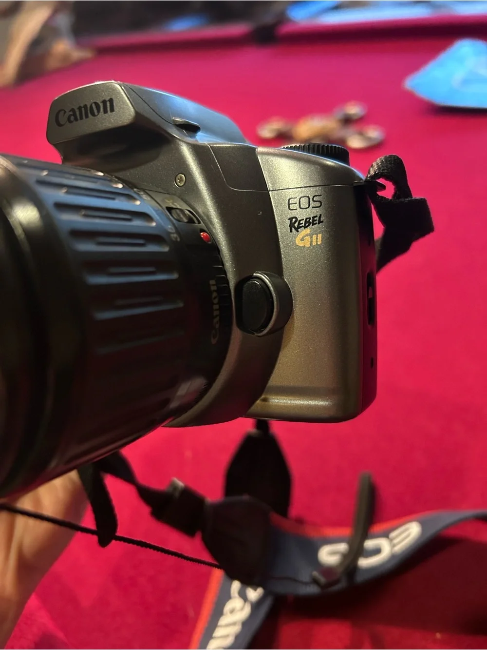 Canon Silver and Black DSLR with 35-80mm Lens
